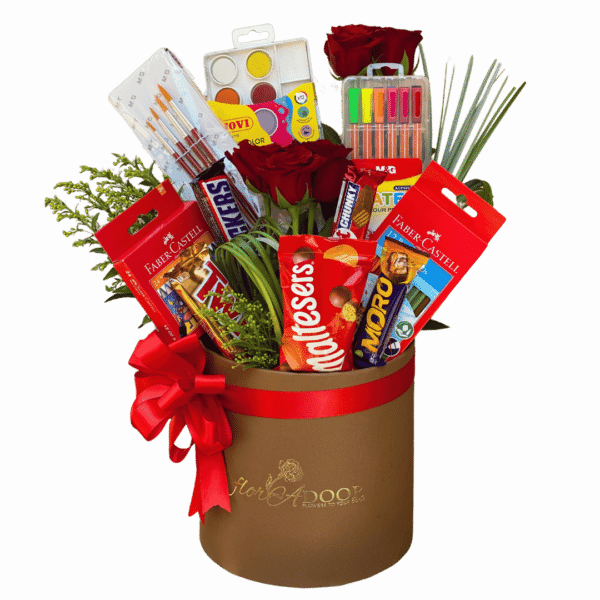 A collection of School supplies arranged together in a gift box with red roses, chocolates and greenery.