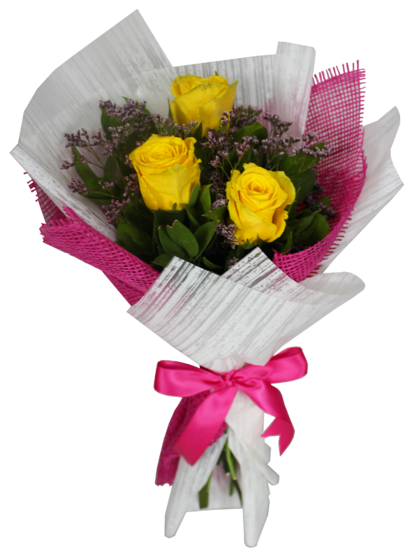 A small flower bouquet of 3 yellow roses with green leaves and white and pink wrapping paper