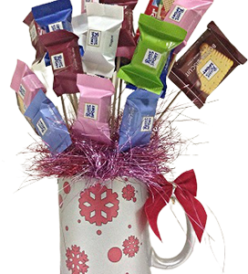 A mug of mini ritter sport chocolates with a decorative design